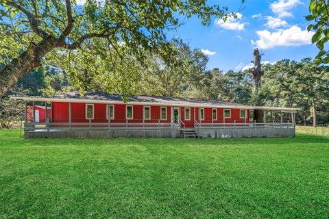 Photo of 21 River Road, Cleveland, TX 77328 (MLS # 9667329)