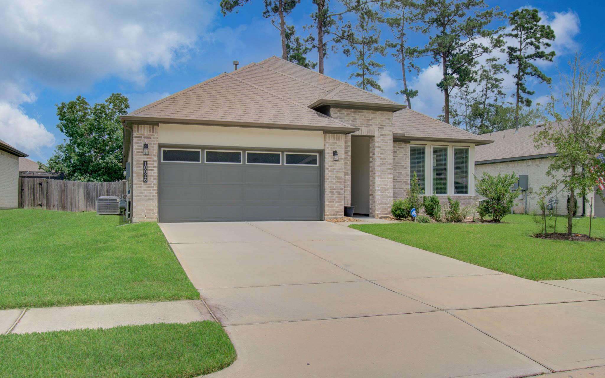 10026 Angelina Woods Lane