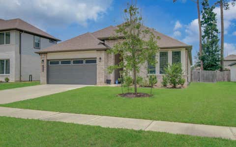 Photo of 10026 Angelina Woods Lane, Conroe, TX 77384 (MLS # 10802931)