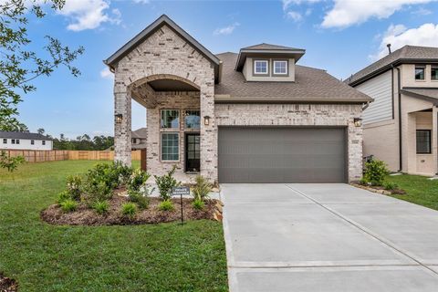 Photo of 12846 Meadow Wind Way Way, Conroe, TX 77302 (MLS # 22989106)