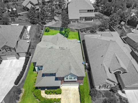 Photo of 18 Garden Path Place, Tomball, TX 77375 (MLS # 60929333)