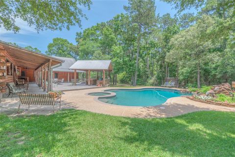 Photo of 14065 Amber Lane, Montgomery, TX 77316 (MLS # 62116996)