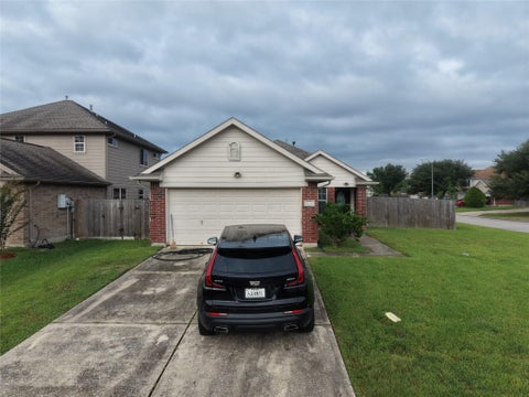Photo of 9523 Deep Valley Drive, Houston, TX 77044 (MLS # 87200339)