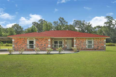 Photo of 20135 Timber Line Ln LN, New Caney, TX 77584 (MLS # 40176806)