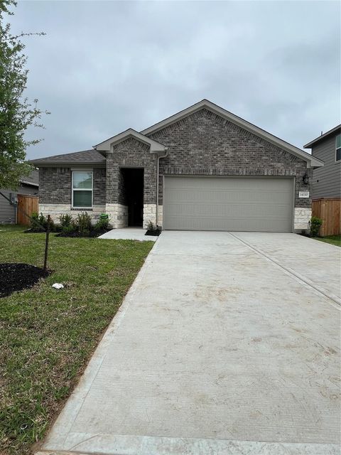 Photo of 14330 Azalea Tree Dr Dr, Houston, TX 77354 (MLS # 93404673)