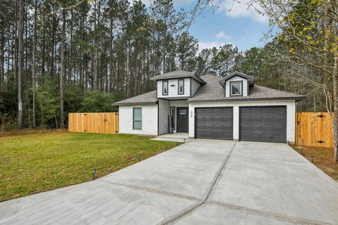 Photo of 298 County Road 3545, Cleveland, TX 77327 (MLS # 56648971)