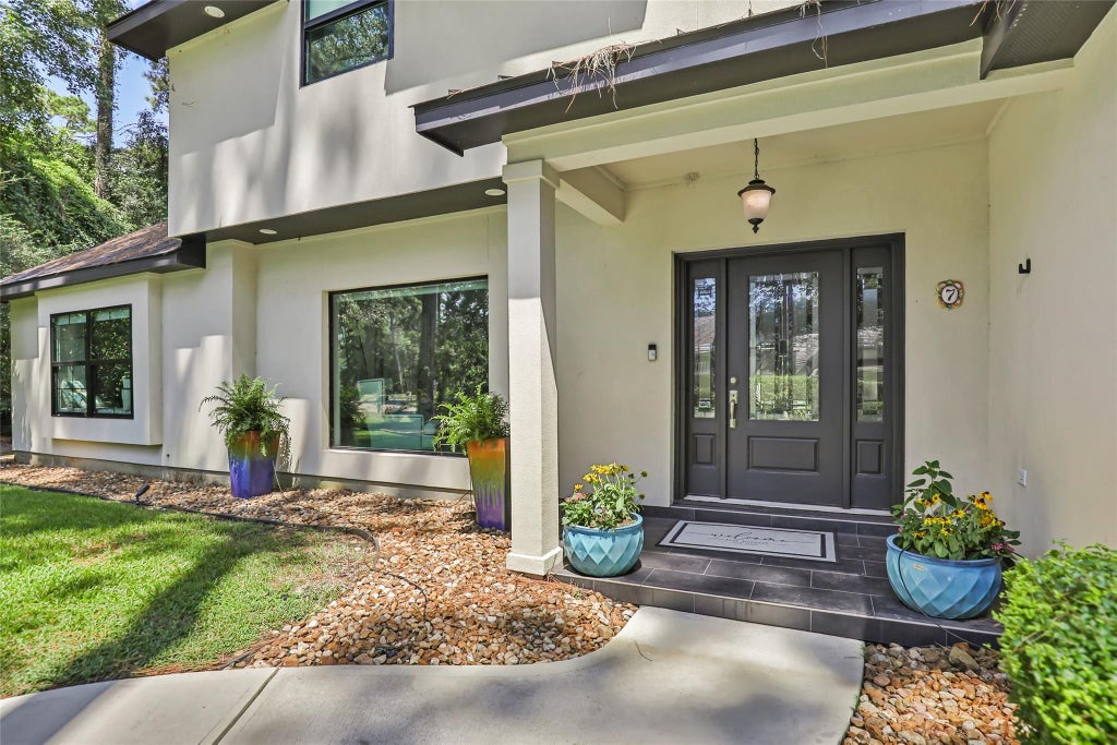 Photo of 7 Summit Lake Drive, Kingwood, TX 77339 (MLS # 55501656)