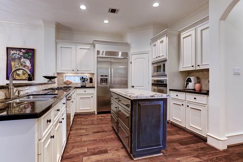 Photo of 13323 Brentonwood Lane, Houston, TX 77077 (MLS # 92716791)