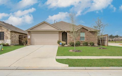 Photo of 14344 Rain Drive, New Caney, TX 77357 (MLS # 82817478)