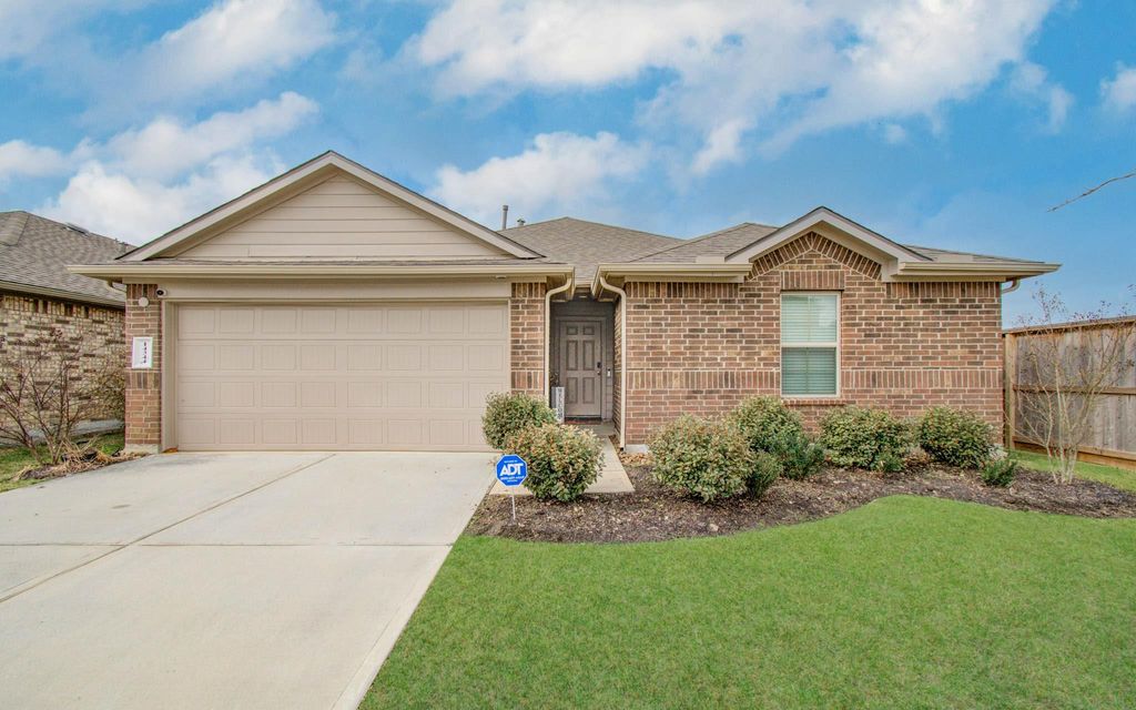 Photo of 14344 Rain Drive, New Caney, TX 77357 (MLS # 82817478)