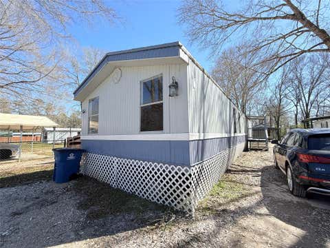 Photo of 23516 Patricia Lane Ln, New Caney, TX 77357 (MLS # 81648490)