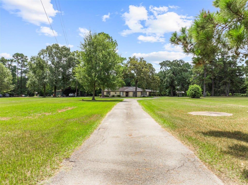 Photo of 15856 Dewberry Lane, Conroe, TX 77302 (MLS # 7617559)