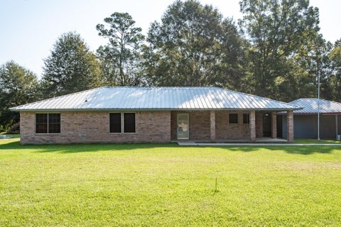 Photo of 27 County Road 3371, Cleveland, TX 77327 (MLS # 48554291)