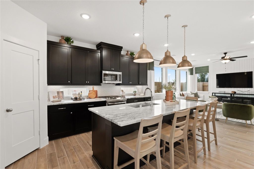 Photo of 7643 Swooping Swallow Lane, Katy, TX 77493 (MLS # 81438296)