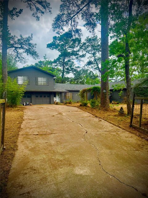 Photo of 1556 County Road 2042, Hull, TX 77564 (MLS # 9859767)