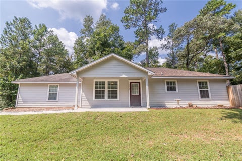 Photo of 10755 Royal York Drive, Conroe, TX 77303 (MLS # 27074919)