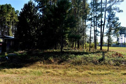 Photo of 900 County Road 3545, Cleveland, TX 77327 (MLS # 12426814)
