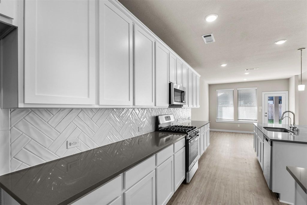 Photo of 8531 Oceanmist Cove Drive, Cypress, TX 77433 (MLS # 77954317)