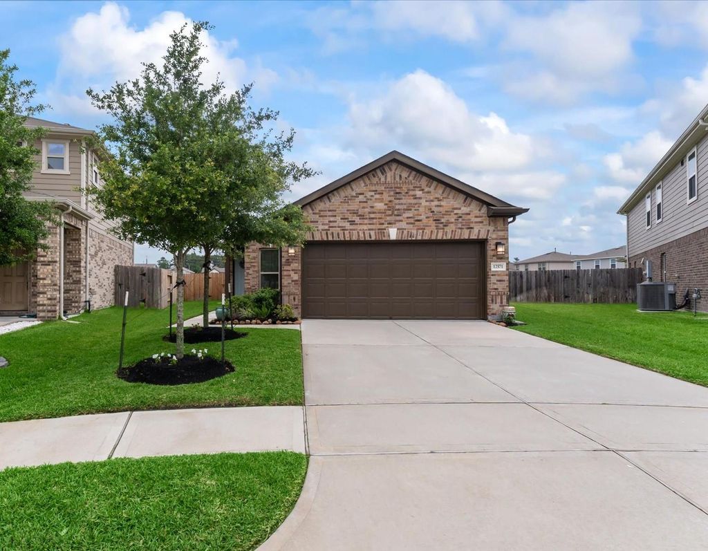 Photo of 12571 New Castle Park Lane, Houston, TX 77044 (MLS # 39549121)