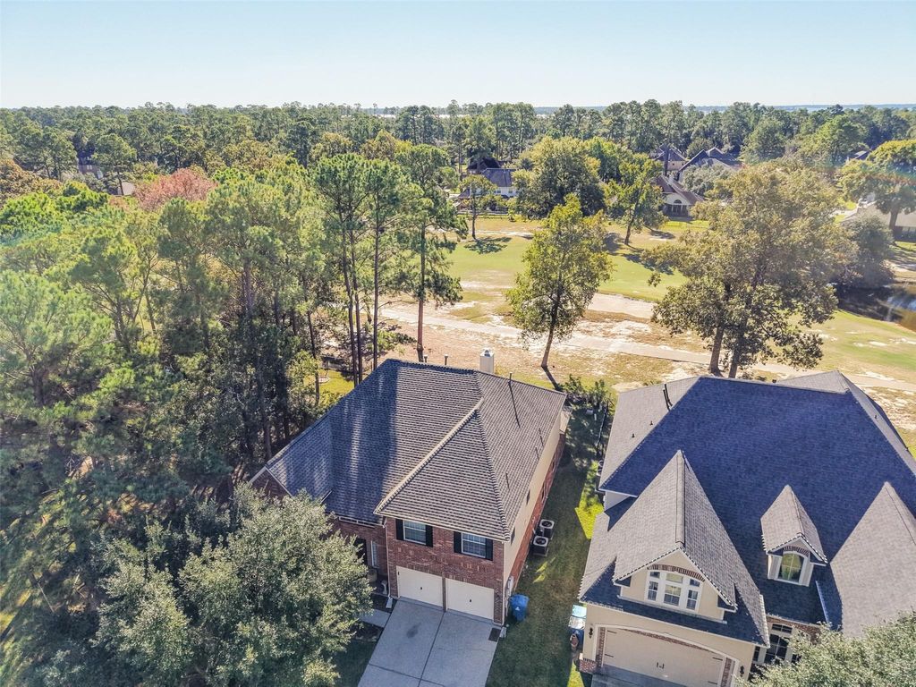Photo of 8402 Hunters Village Drive, Humble, TX 77346 (MLS # 54874867)