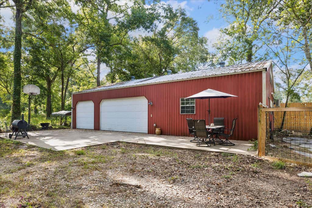 Photo of 10765 Champion Forest Road, Conroe, TX 77303 (MLS # 78543652)
