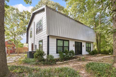 Photo of 10765 Champion Forest Road, Conroe, TX 77303 (MLS # 78543652)