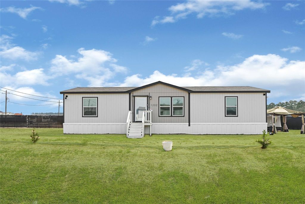 Photo of 1202 Long Leaf Pine Street, Huffman, TX 77336 (MLS # 74431895)