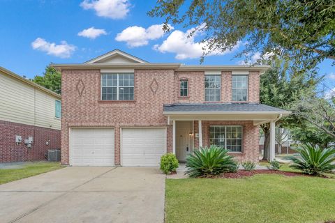 Photo of 17602 S Summit Canyon Drive, Houston, TX 77095 (MLS # 92830141)