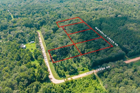Photo of 0 Magnolia Creek Dr, Cleveland, TX 77328 (MLS # 56877954)