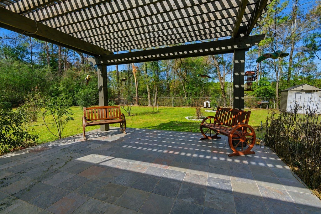 Photo of 20281 N Hillcrest Drive, Porter, TX 77365 (MLS # 87521396)
