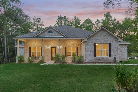 Photo of 151 Dedication Trail, Huntsville, TX 77340 (MLS # 31349294)