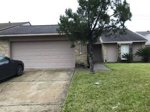 Photo of 10202 Pebble Park Lane, Houston, TX 77036 (MLS # 22742380)