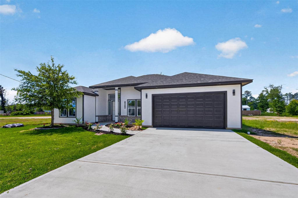 Photo of 1014 Exotic Pine Drive, Huffman, TX 77336 (MLS # 36754137)