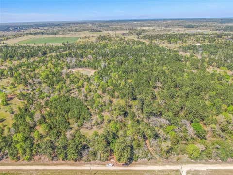 Photo of 3656 Luthe Road, Bedias, TX 77831 (MLS # 23235962)