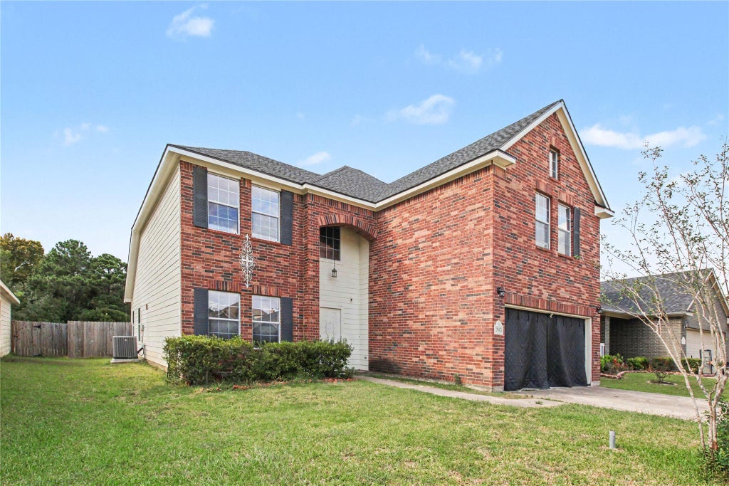 Photo of 2043 Briar Grove Drive, Conroe, TX 77301 (MLS # 97876912)