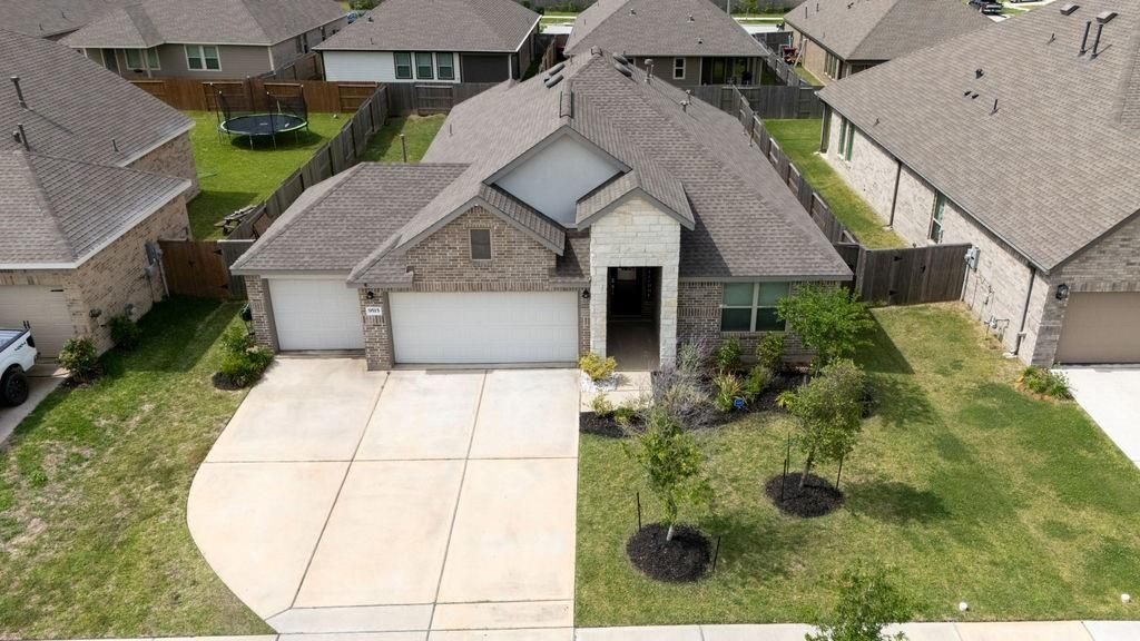Photo of 9515 Twilight Briar Lane, Baytown, TX 77521 (MLS # 42040200)