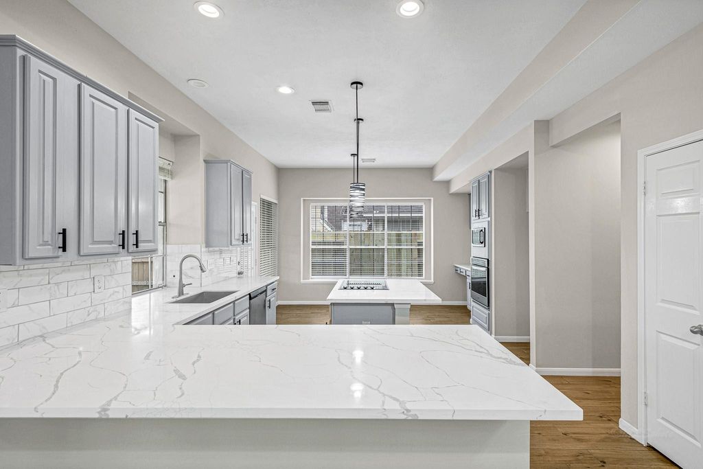 Photo of 8827 Lawncliff Lane, Houston, TX 77040 (MLS # 51341011)