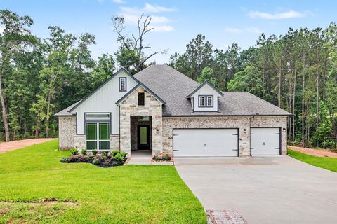 Photo of 9570 Moss Rose LN, Willis, TX 77378 (MLS # 86069778)