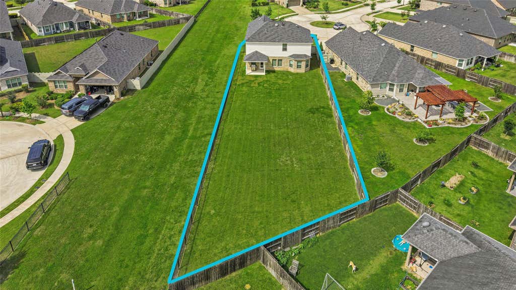 Photo of 9702 Migrant Hawker Court, Conroe, TX 77385 (MLS # 35408187)