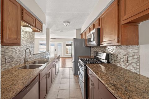Photo of 6424 Kentwick Drive #24/3, Houston, TX 77084 (MLS # 62301109)