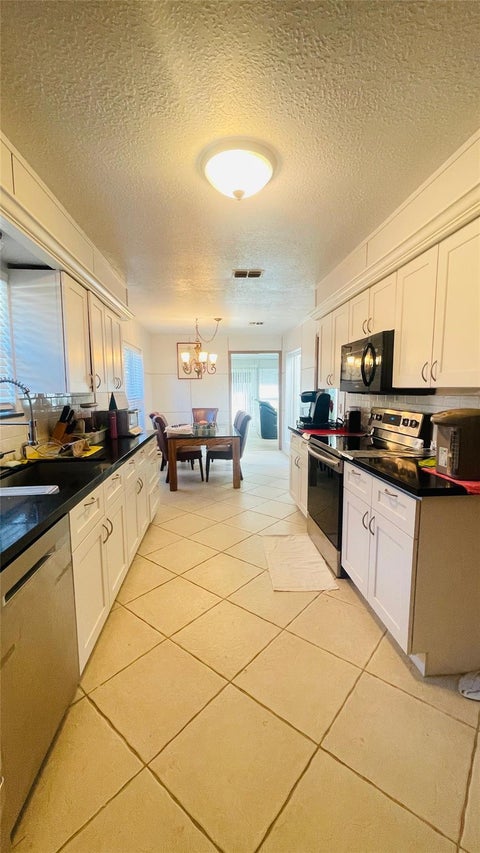 Photo of 5218 Pine Cliff Drive, Houston, TX 77084 (MLS # 46682440)