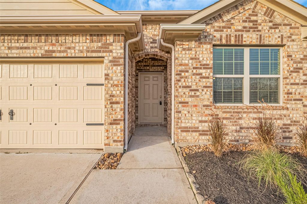 Photo of 20123 Timbernook Pass, New Caney, TX 77357 (MLS # 97432402)