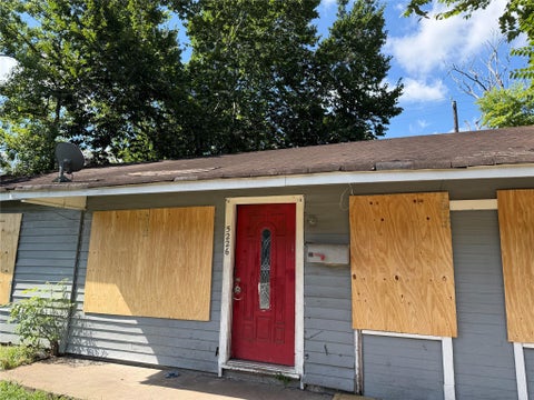 Photo of 5226 Pensdale Street, Houston, TX 77033 (MLS # 33712201)