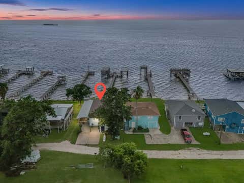 Photo of 211 Captains Road, Anahuac, TX 77514 (MLS # 82018053)