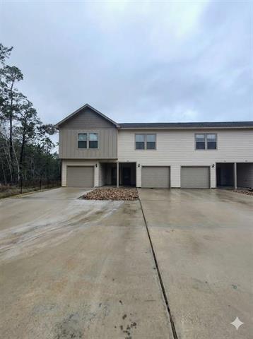 Photo of 5670 Shadowbend Circle CIR W #103, Lumberton, TX 77657 (MLS # 88454271)