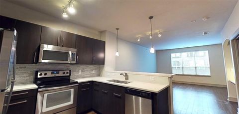 Photo of 1340 W Gray Street #203, Houston, TX 77019 (MLS # 77196674)