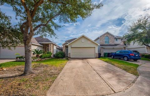 Photo of 7839 Winding Creek View, Houston, TX 77072 (MLS # 22352185)