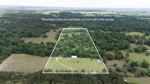Photo of 2077 County Road 408, Navasota, TX 77868 (MLS # 51874801)