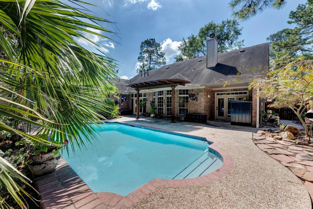 Photo of 1906 Leatherstem Lane, Houston, TX 77345 (MLS # 90239970)