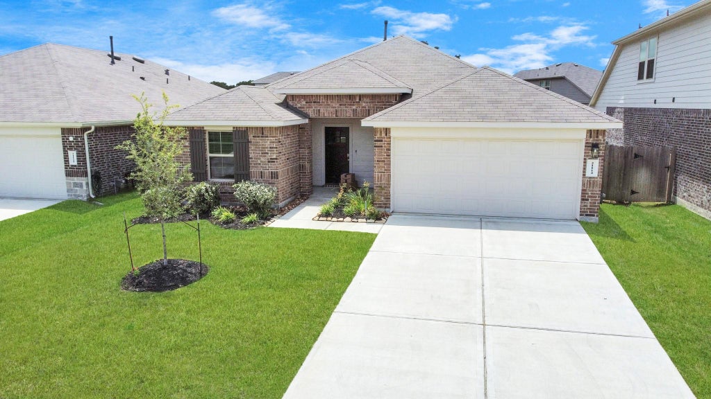 Photo of 21114 Waze Lewis Drive, New Caney, TX 77357 (MLS # 12601097)